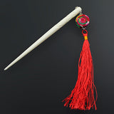 Handmade Carved Cattle Horn Hair Stick with Red Tassels
